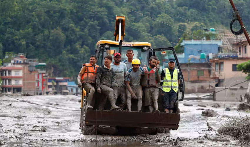 Nepal-Tibet floods death toll tops 700 as China identifies missing foreigners